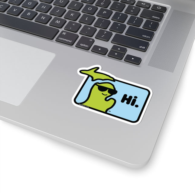 Sticker with Michigan character with sunglasses waving and saying "Hi" on a laptop.