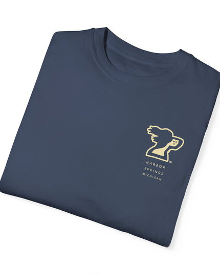 Folded dark blue color t-shirt by the Harbor Springer brand with a springer spaniel dog logo and Harbor Springs Michigan text.
