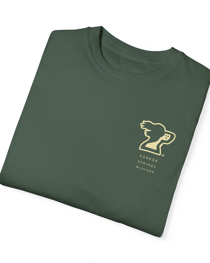 Folded forest green color t-shirt by the Harbor Springer brand with a springer spaniel dog logo and Harbor Springs Michigan text.
