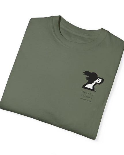 Folded green color t-shirt by the Harbor Springer brand with a springer spaniel dog logo and Harbor Springs Michigan text.