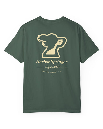Forest green t-shirt by the Harbor Springer brand with a springer spaniel dog logo and Brease On tagline on the back.
