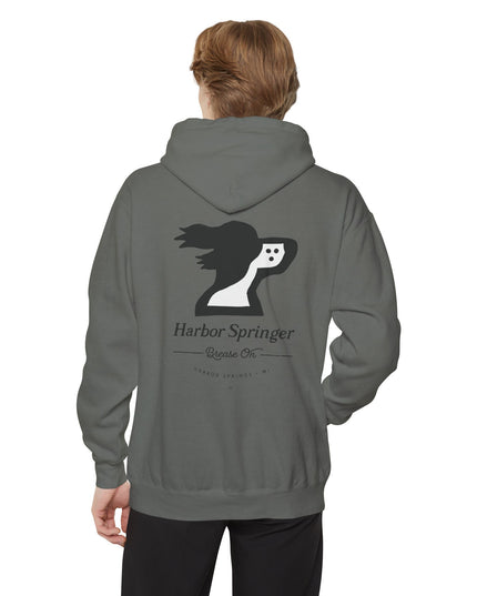 Man wearing a gray hoodie by the Harbor Springer brand with a springer spaniel dog logo and Brease On tagline on the back.