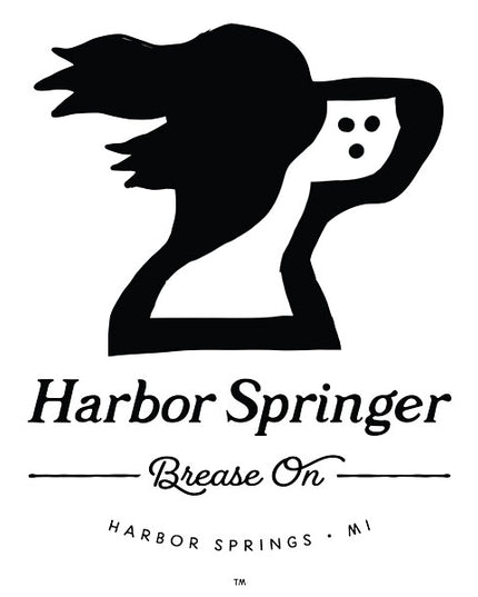 Clothing design featuring a springer spaniel dog logo and Brease On tagline by the Harbor Springer brand.