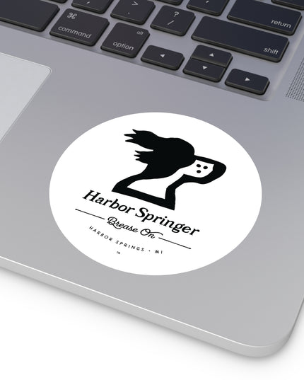Larger round laptop sticker of Michigan brand Harbor Springer springer spaniel dog logo with Brease On tagline.
