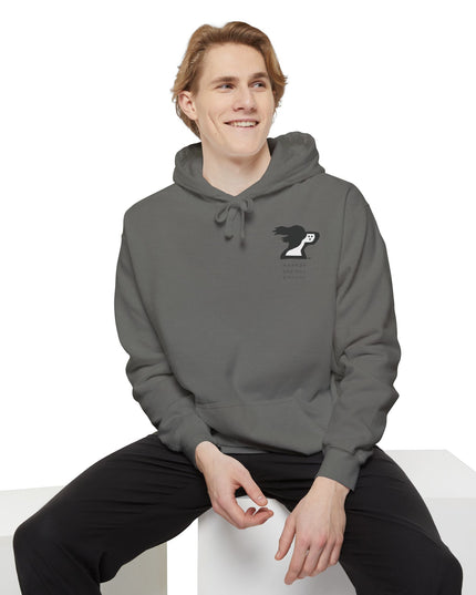 Man wearing a gray color hoodie by the Harbor Springer brand with a springer spaniel dog logo and Harbor Springs Michigan text.