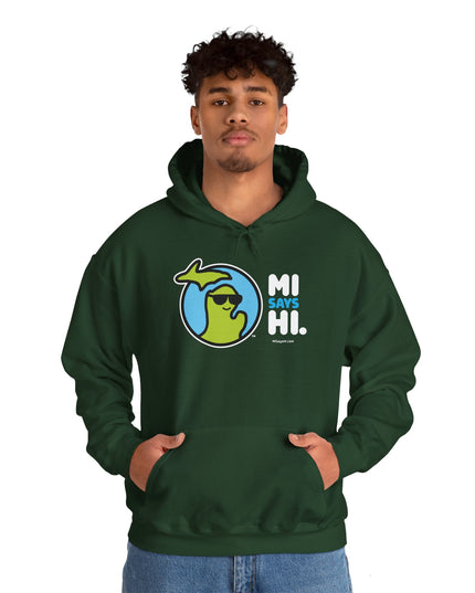 Man wearing a green hoodie with waving Michigan logo wearing sunglasses and smiling for the MI Says Hi brand.