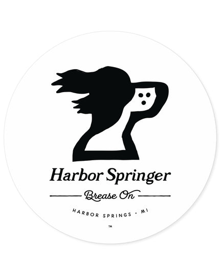 Large round sticker of Michigan brand Harbor Springer springer spaniel dog logo with Brease On tagline.