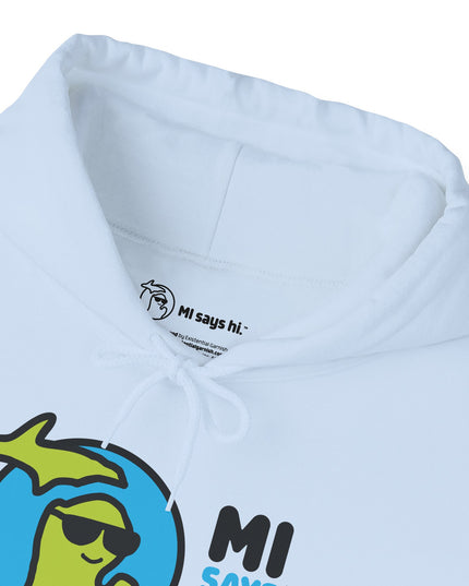 Closeup of neck label of a light blue hoodie with waving Michigan logo wearing sunglasses and smiling for the MI Says Hi brand.