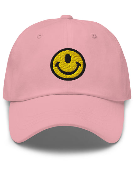 Pink baseball hat with the Smileclops™ brand logo of a one-eyed smile face, the official logo of resilient positivity for those who remain, in all things, Oddly Happy™.