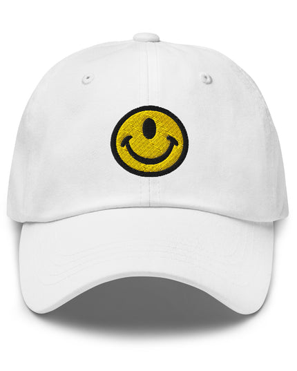 White hat with the Smileclops™ brand logo of a one-eyed smile face, the official logo of resilient positivity for those who remain, in all things, Oddly Happy™.