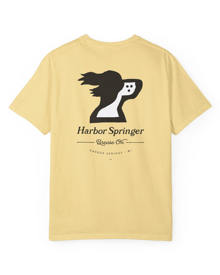 Light yellow t-shirt by the Harbor Springer brand with a springer spaniel dog logo and Brease On tagline on the back.